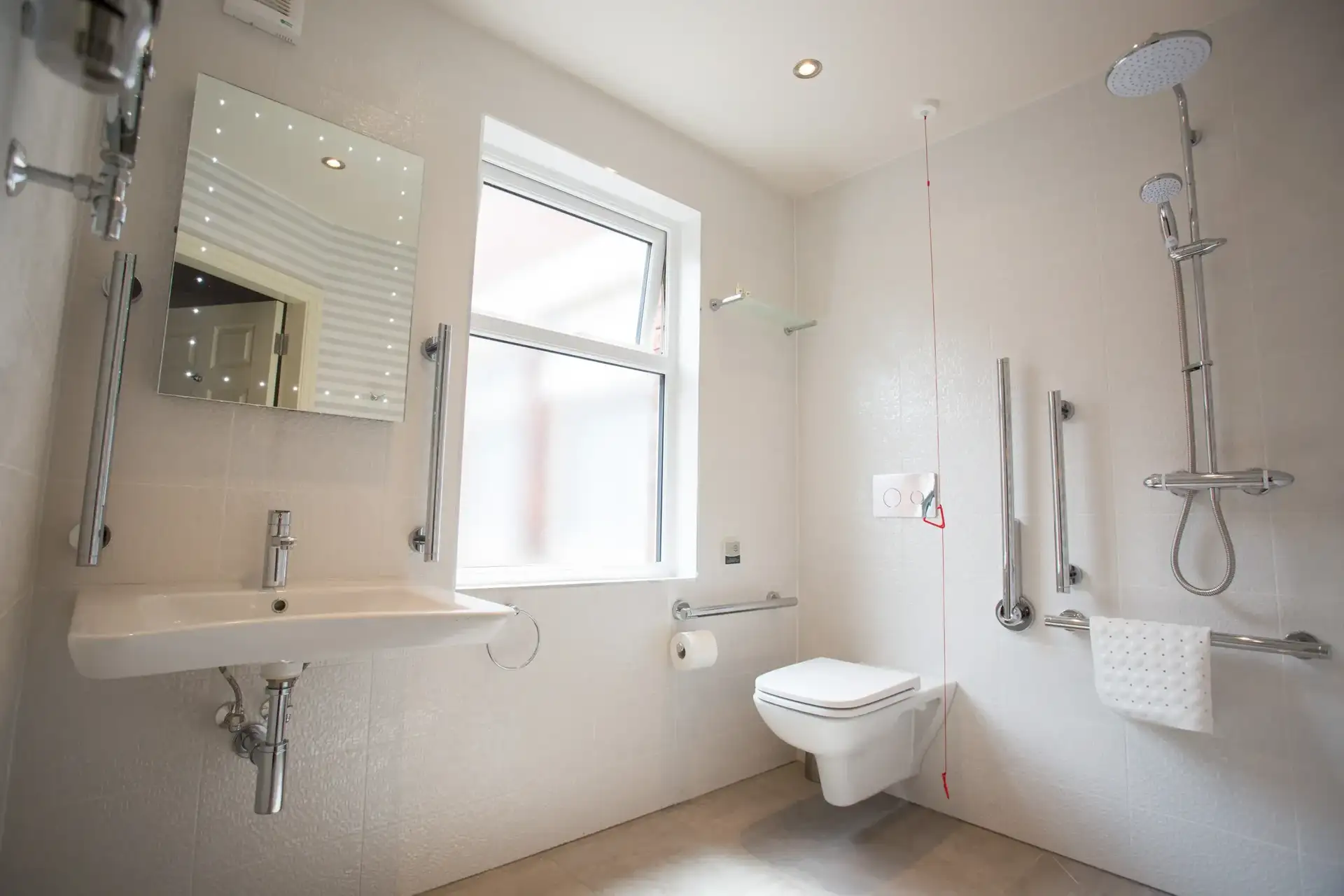 simple-hotel-bathroom-interior-with-white-walls-wi-2025-02-02-15-21-46-utc-scaled_webp